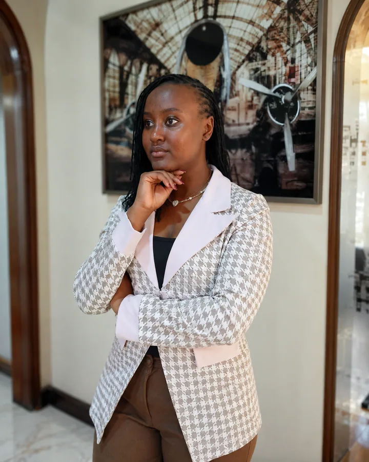 Faith Kerubo in a patterned cream blazer